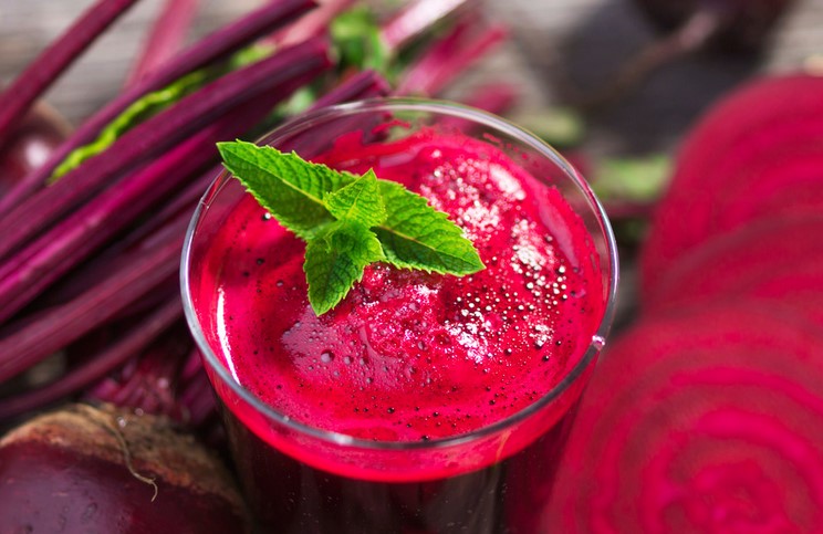 Who should not drink beet juice?